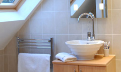 Sink and towel rail in loft conversoin bathroom